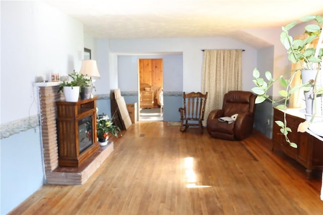 living area featuring hardwood / wood-style floors