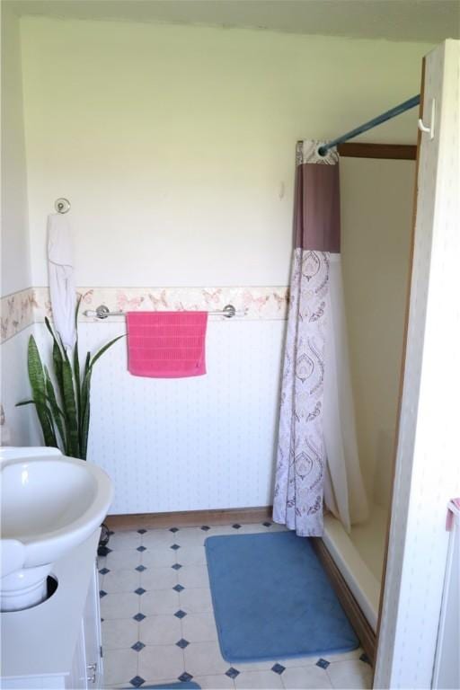 bathroom with vanity and walk in shower