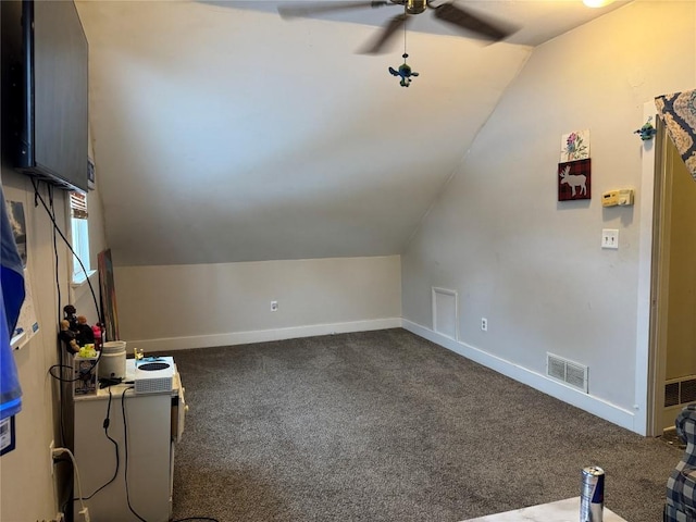 bonus room featuring ceiling fan, vaulted ceiling, and carpet flooring