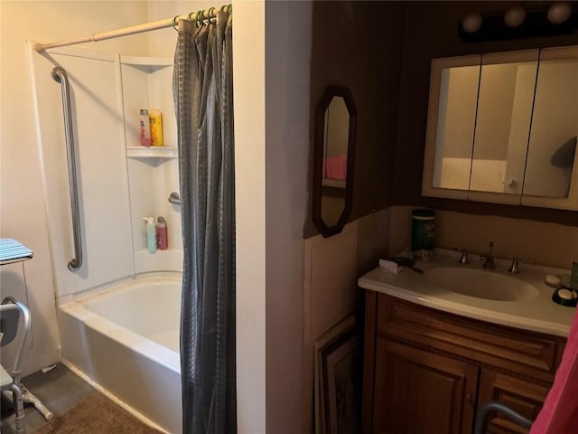 bathroom featuring shower / bath combo with shower curtain and vanity