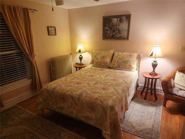 bedroom featuring wood-type flooring