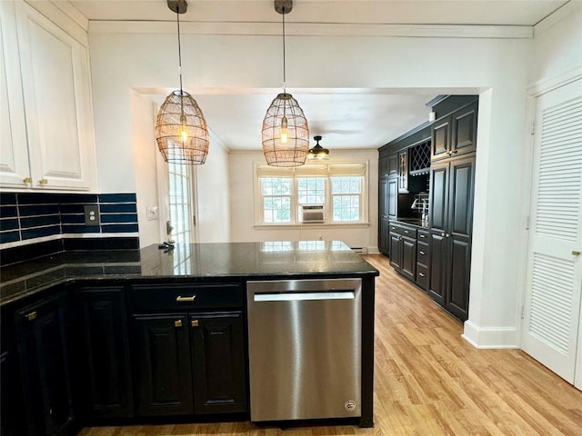 kitchen featuring white cabinetry, dishwasher, pendant lighting, light hardwood / wood-style floors, and decorative backsplash