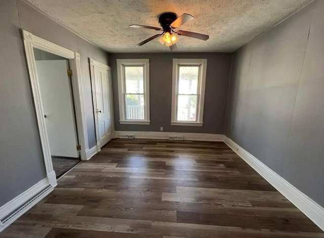 1121 E 27th St, Erie, PA 16504 - empty room with a textured ceiling, wood finished floors, a ceiling fan, and baseboards