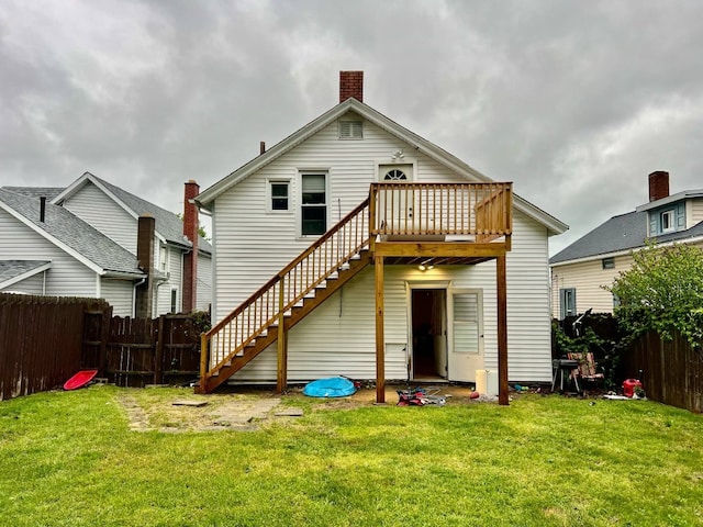 1121 E 27th St, Erie, PA 16504 - back of property featuring stairs, a deck, and a chimney