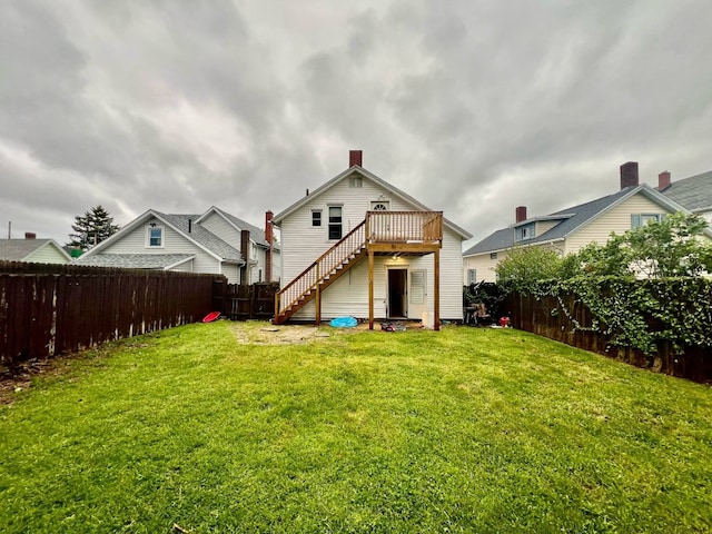 1121 E 27th St, Erie, PA 16504 - rear view of property with stairs, a wooden deck, and a chimney