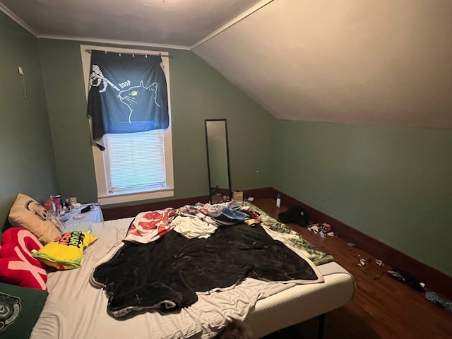 1121 E 27th St, Erie, PA 16504 - bedroom with wood finished floors, vaulted ceiling, baseboards, and ornamental molding