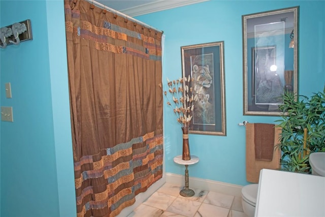 bathroom with tile patterned flooring, toilet, crown molding, and a shower with shower curtain