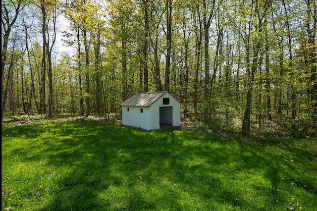 9170 Storey Rd, North East, PA 16428 - view of green lawn with a forest view
