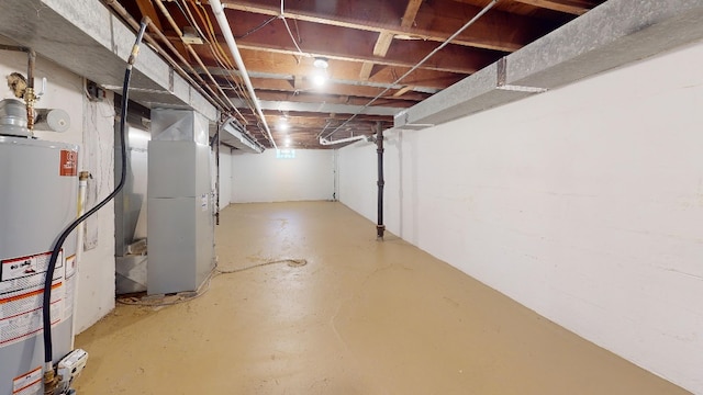 9170 Storey Rd, North East, PA 16428 - unfinished below grade area featuring water heater and heating unit