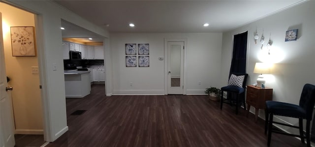 interior space with dark hardwood / wood-style floors