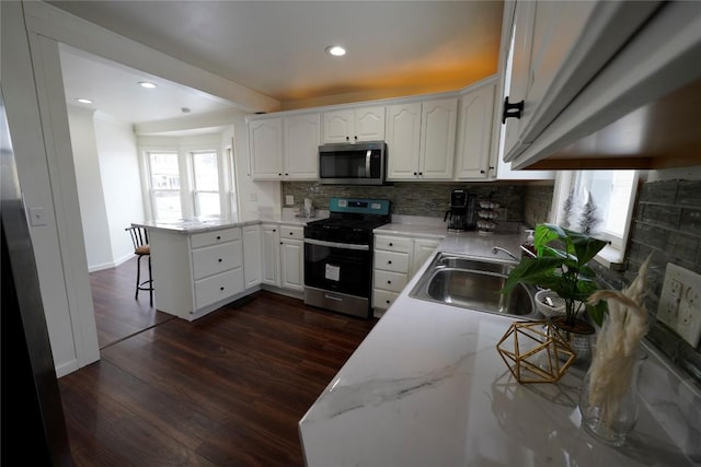 living room with dark hardwood / wood-style floors