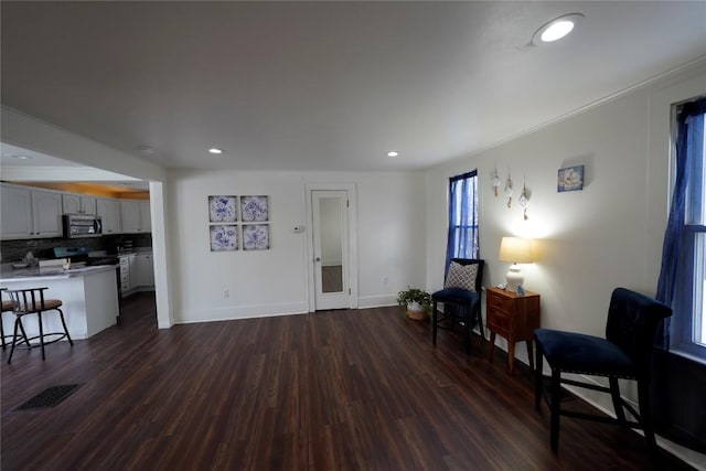 interior space with dark hardwood / wood-style floors