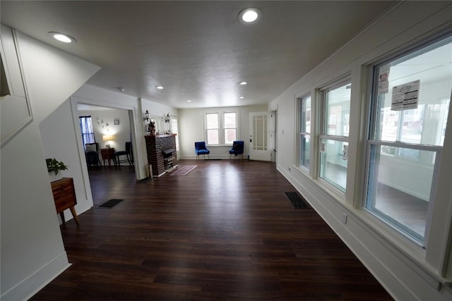 dining room with dark hardwood / wood-style flooring