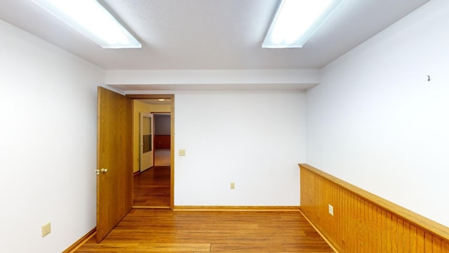 spare room featuring light wood-type flooring