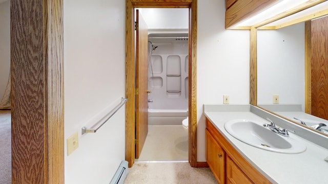 full bathroom featuring vanity, toilet, baseboard heating, and tub / shower combination