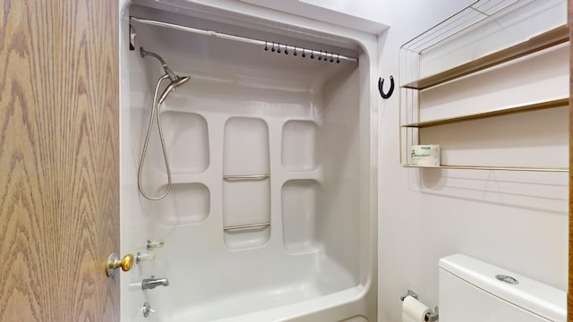 bathroom with shower / bathtub combination and toilet