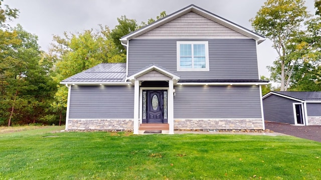 front of property with a front yard