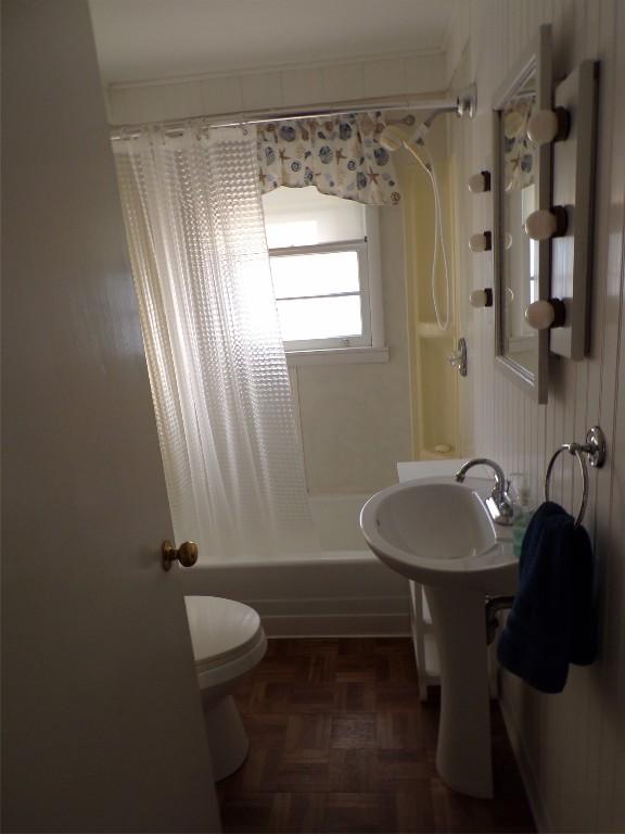 179 Elk Creek Rd, Lake City Boro, PA 16423 - bathroom with shower / bath combination with curtain and crown molding