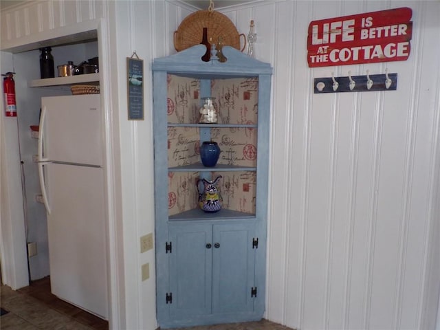 179 Elk Creek Rd, Lake City Boro, PA 16423 - detailed view of freestanding refrigerator and a fire extinguisher