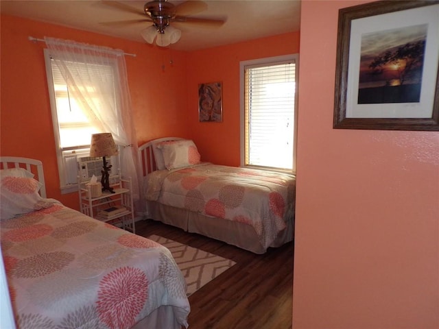 179 Elk Creek Rd, Lake City Boro, PA 16423 - bedroom with wood finished floors, ceiling fan, and cooling unit