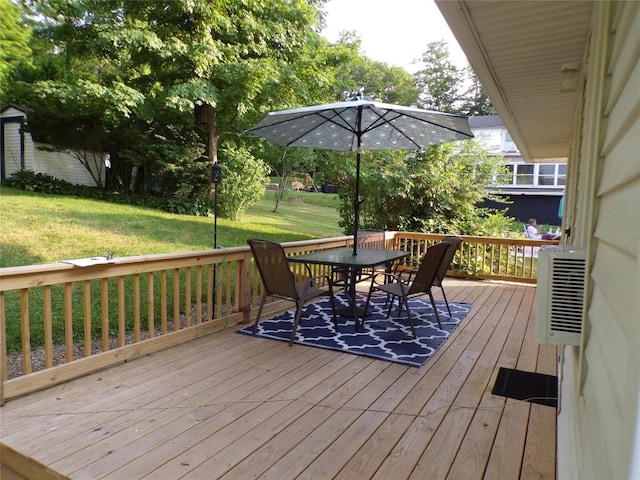 179 Elk Creek Rd, Lake City Boro, PA 16423 - deck featuring outdoor dining space and a yard