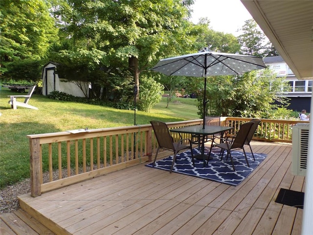 179 Elk Creek Rd, Lake City Boro, PA 16423 - deck featuring outdoor dining space and a yard