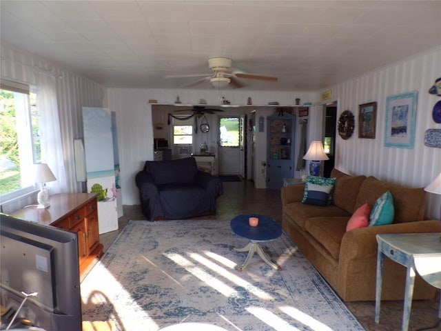 179 Elk Creek Rd, Lake City Boro, PA 16423 - living room with healthy amount of natural light, a ceiling fan, and wallpapered walls