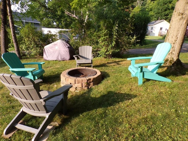 179 Elk Creek Rd, Lake City Boro, PA 16423 - view of grassy yard featuring a fire pit