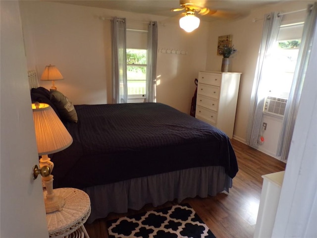 179 Elk Creek Rd, Lake City Boro, PA 16423 - bedroom featuring wood finished floors, cooling unit, and a ceiling fan