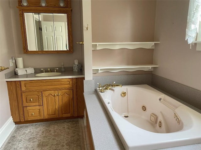 bathroom featuring vanity and a tub to relax in