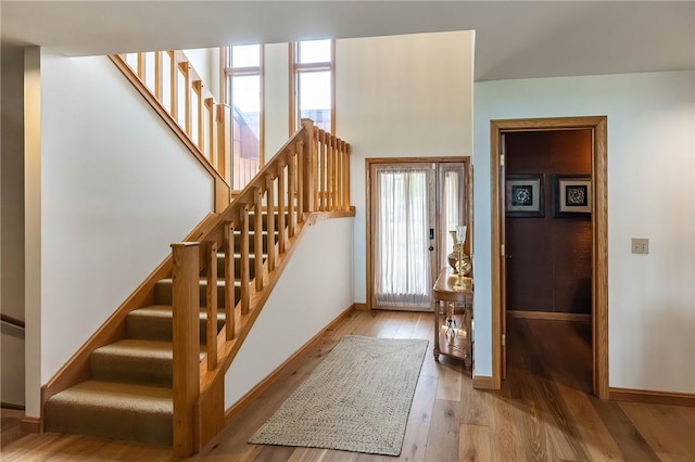 foyer with light hardwood / wood-style floors