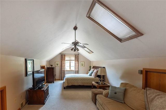 carpeted bedroom with ceiling fan and lofted ceiling