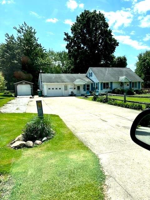 1233 Gunton Dr, Fairview, PA 16415 - ranch-style home with driveway, a front lawn, and an attached garage