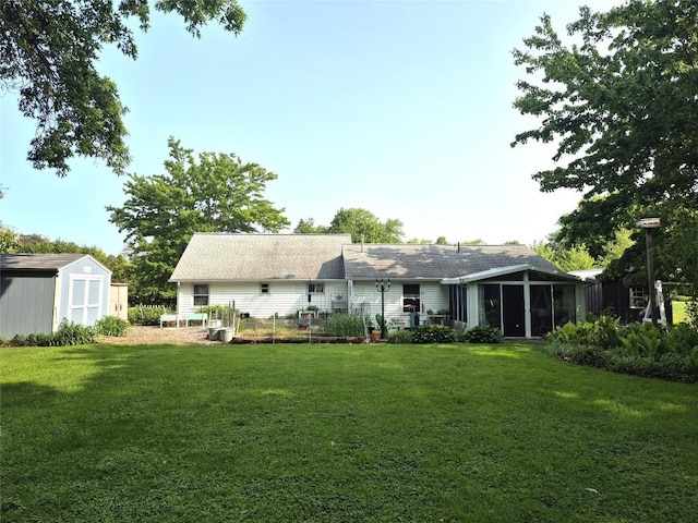 1233 Gunton Dr, Fairview, PA 16415 - rear view of property with a sunroom and a lawn
