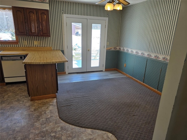 doorway to outside with ceiling fan and french doors