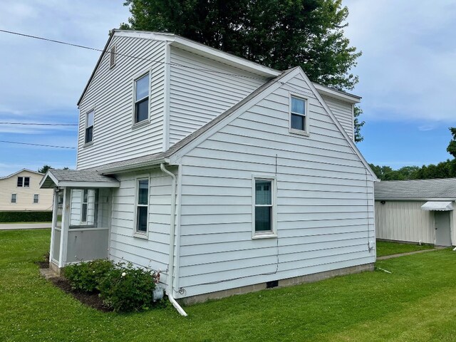 1003 Filmore Ave, Erie, PA 16505 - view of home's exterior with a yard and a shingled roof