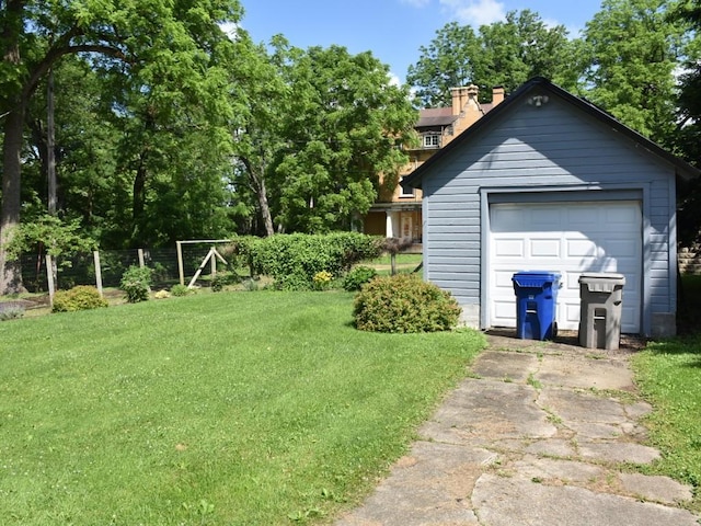 221 Locust St, Meadville, PA 16335 - view of grassy yard featuring a garage and concrete driveway