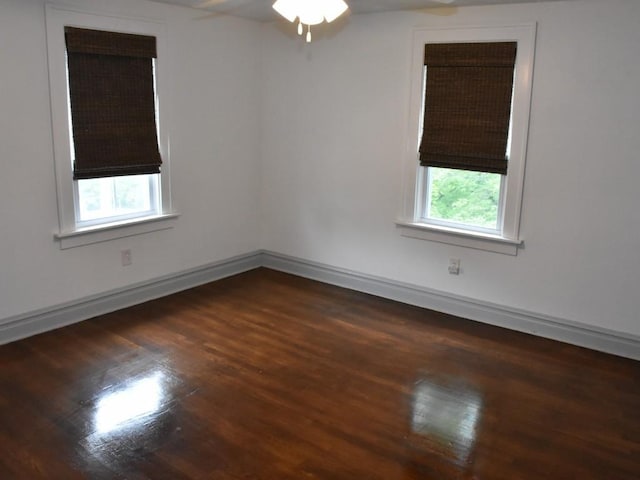 221 Locust St, Meadville, PA 16335 - empty room featuring dark wood-style floors and a ceiling fan
