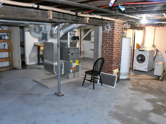 221 Locust St, Meadville, PA 16335 - unfinished below grade area with washer / clothes dryer, gas water heater, and heating unit