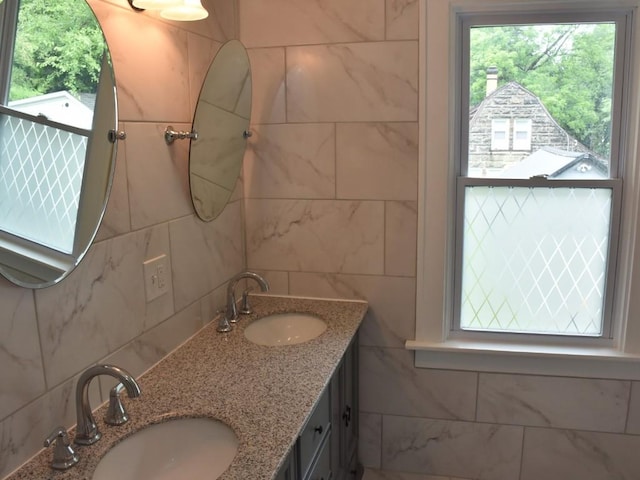 221 Locust St, Meadville, PA 16335 - full bath featuring double vanity and tasteful backsplash