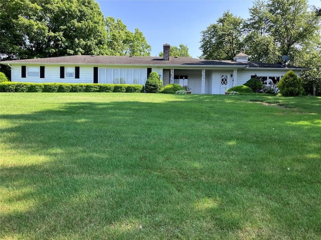 324 Anderson St, Erie, PA 16509 - ranch-style house featuring a chimney and a front lawn