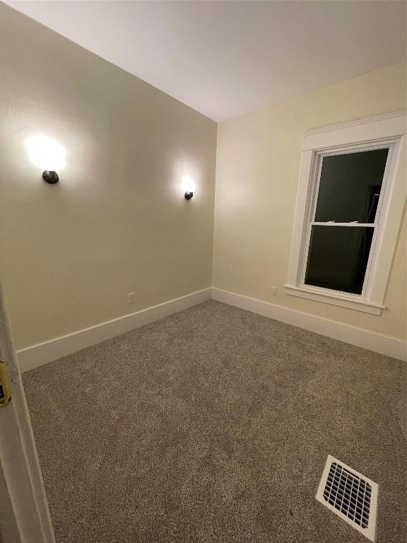 empty room with carpet floors