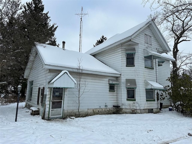 view of snow covered property