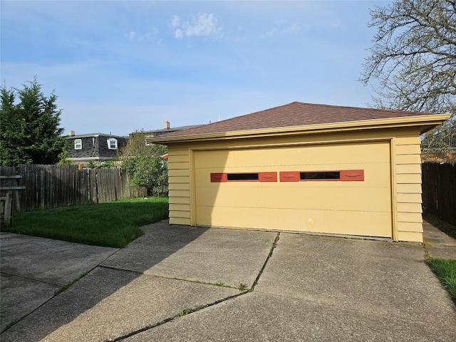 detached garage with fence