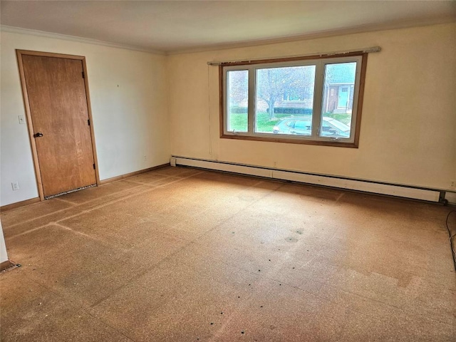 unfurnished room featuring crown molding, baseboards, and baseboard heating
