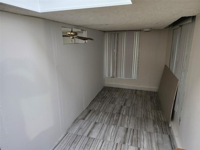 spare room with ceiling fan