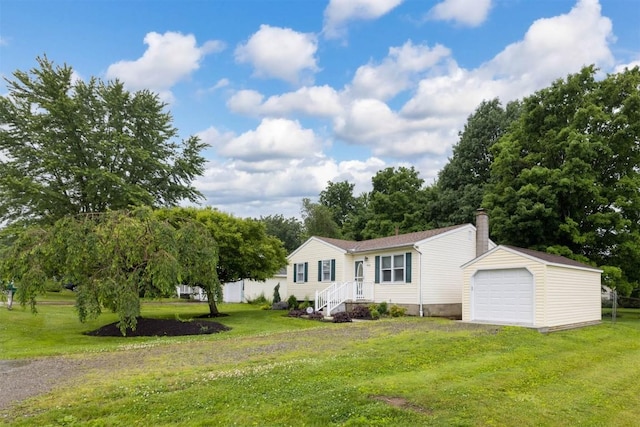 4164 Emily Dr, North East, PA 16428 - manufactured / mobile home featuring a front yard, a garage, a chimney, and driveway