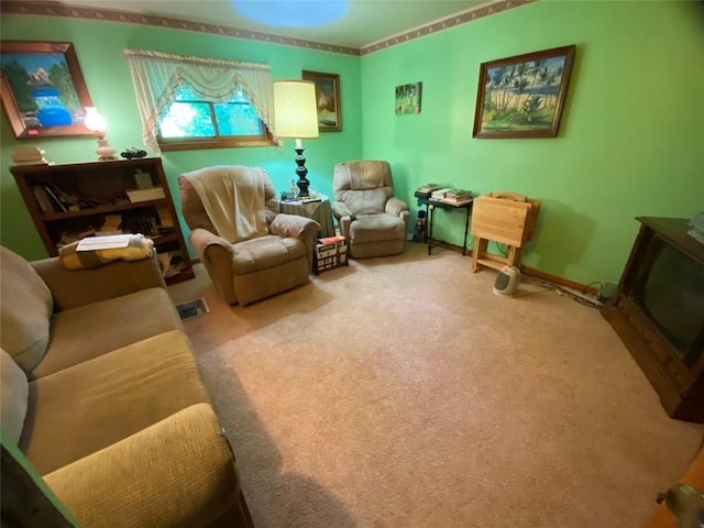 living area featuring carpet