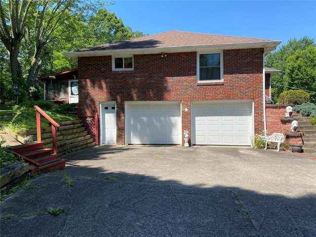 exterior space with a garage