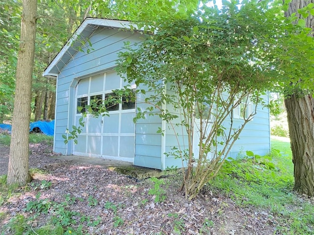 view of outbuilding with a garage